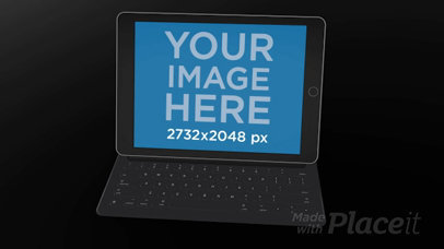 Black iPad Pro Video in Landscape Position with Keyboard Standing on a Black Surface
