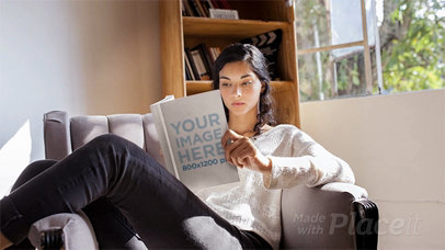 Pretty Woman Reading a Book While Resting on her Armchair in Stop Motion