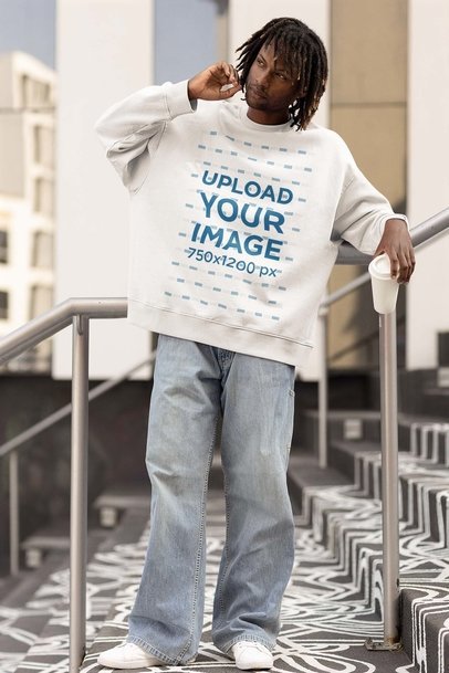 Baggy Sweatshirt Mockup Featuring a Man Holding a Beverage m25236
