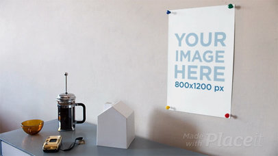 Moving Objects On a Table Below a Poster on the Wall in Stop Motion