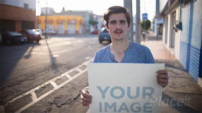 Dude Sticking a Poster to a Wall In The Street Stop Motion Mockup