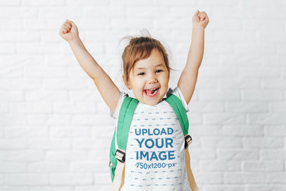 Heathered T-Shirt Mockup Featuring a Happy Girl Raising Her Hands