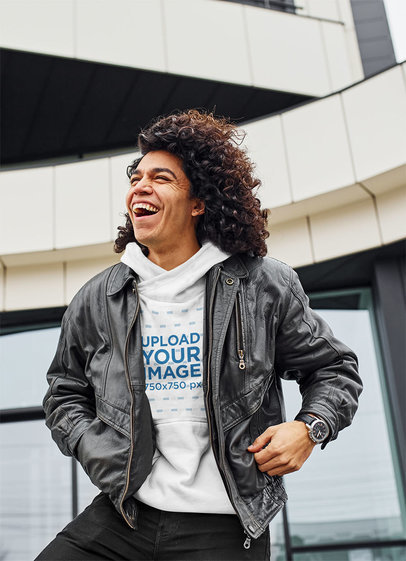 Hoodie Mockup of a Curly-Haired Man Laughing