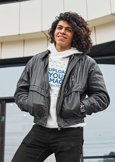Pullover Hoodie Mockup of a Man with Curly Hair Wearing a Leather Jacket