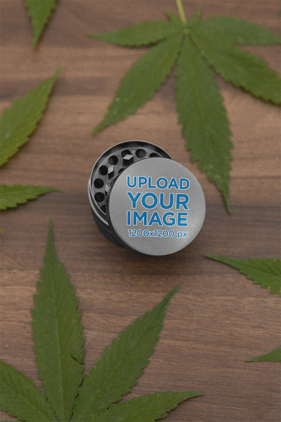 Grinder Mockup Featuring Marijuana Leaves over a Wooden Surface m25434