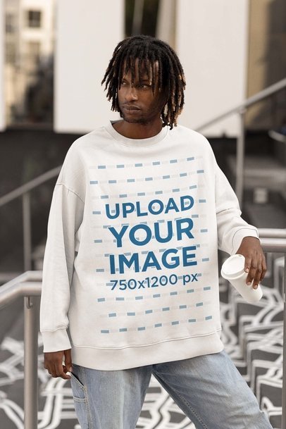 Mockup of a Man Posing with an Oversized Crewneck Sweatshirt