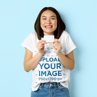 T-Shirt Mockup of a Smiling Woman Holding a Card m24877 r-el2
