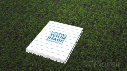 Hard Cover Book Video Lying on the Grass