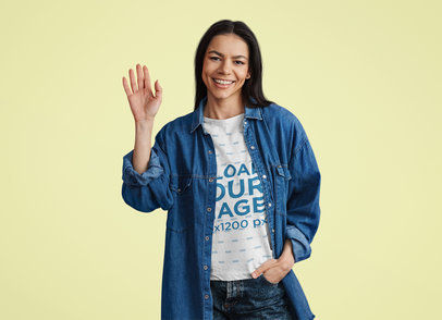 T-Shirt Mockup of a Smiling Woman Waving at the Camera