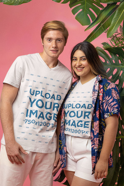 Mockup of a Happy Couple Wearing V-Neck T-Shirts in a Studio