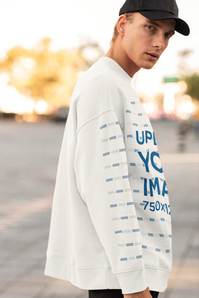 Oversized Sweatshirt Mockup Featuring a Serious Man Looking at the Camera