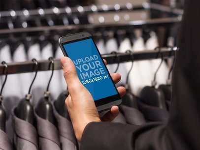 HTC One Mockup in a Suit Store