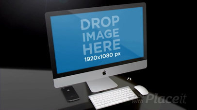 Black Room with a Black iPhone Earpods and an iMac Mockup Video a15826b