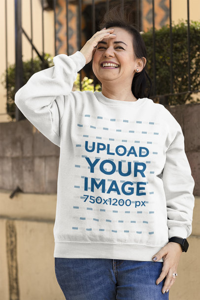 Mockup of a Smiling Woman Wearing a Crewneck Sweatshirt and Touching Her Face