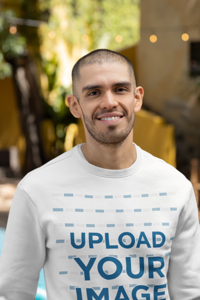 Mockup of a Happy Man Wearing a Crewneck Sweatshirt Outside