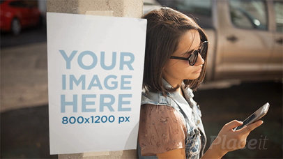 Trendy Girl Noticing a Poster Stop Motion on a Pole a13742