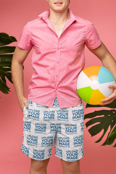Swimming Shorts Mockup of a Man Holding a Beach Ball