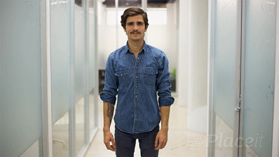 Millennial Guy with Mustache Shows a Business Card in Stop Motion