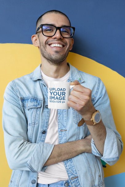 Mockup of a Geeky-Looking Man Holding an 11 oz Coffee Mug