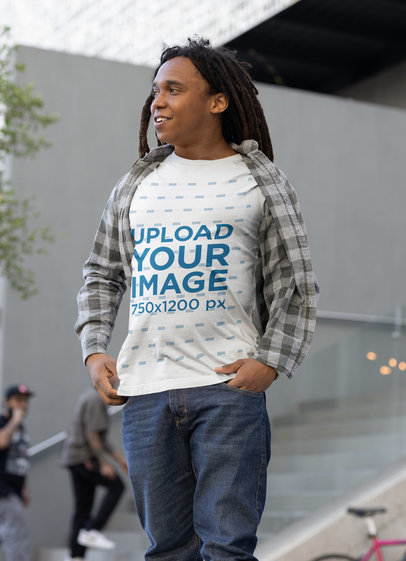 Round-Neck Tee Mockup of a Man with Long Locs Standing on The Stairs m24762