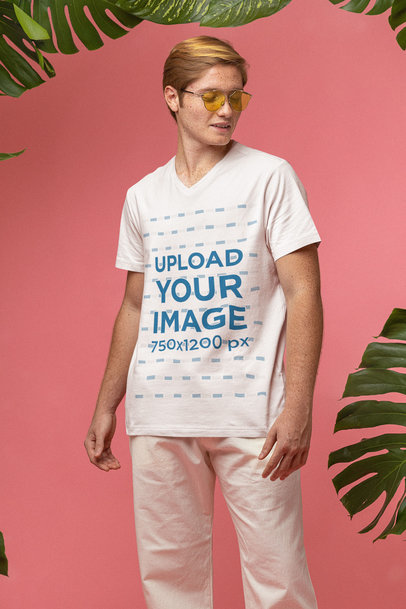Mockup of a Cool Man Wearing a V-Neck T-Shirt and Sunglasses in a Summer-Themed Studio