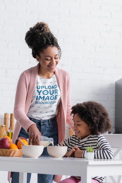 Sublimated T-Shirt Mockup of a Woman Serving Breakfast to Her Daughter m7324-r-el2