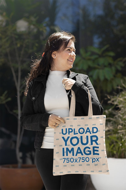 Tote Bag Mockup Featuring a Woman on the Street