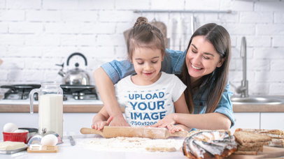 T-Shirt Mockup of a Little Girl Baking with her Mom