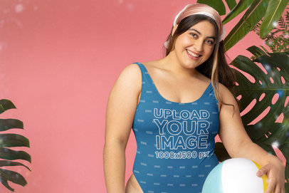 Mockup of a Smiling Woman Wearing a Sublimated Swimsuit and Holding a Beach Ball 