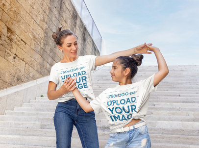 T-Shirt Mockup Featuring a Mother and Her Daughter on a Staircase