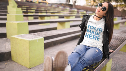 Girl Moving her Feet Wearing a T-Shirt Cinemagraph Mockup at an Urban Environment a13513