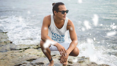 Surfer Guy Wearing a Tank Top Cinemagraph Mockup at a Rocky Shore