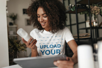 T-Shirt Mockup of a Young Woman Reviewing a Product m11927-r-el2