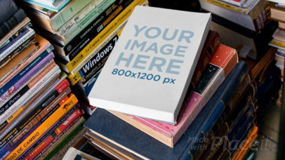 Hovering Over a Book Video Lying Over a Pile of Books a13952