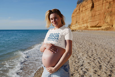 Crop Top Mockup Featuring a Pregnant Woman at the Beach