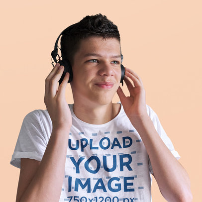 T-Shirt Mockup of a Teenage Boy Listening to Music on his Headphones