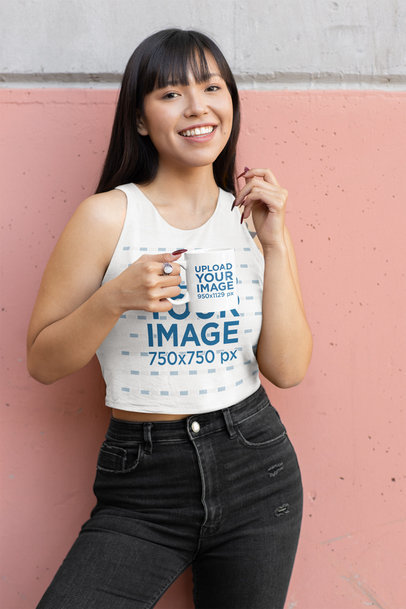 Tank Top Mockup of a Woman with Long Hair Holding an 11 oz Coffee Mug