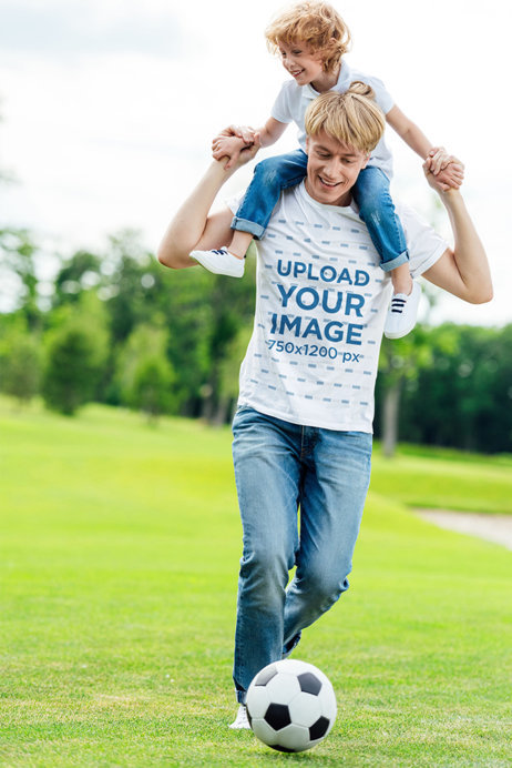 T-Shirt Mockup Featuring a Man Playing Soccer With His Son