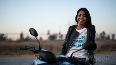 Smiling Biker Girl Wearing a T-Shirt Stop Motion and a Leather Jacket Outdoors a13581