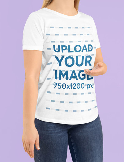 Mockup of a Cropped Face Woman Pointing at her T-Shirt
