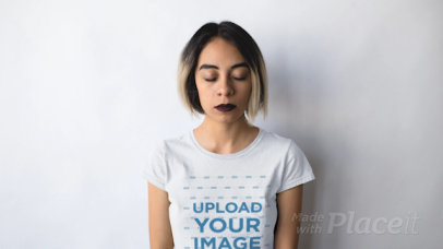 Edgy Woman With Paper Airplane Circling Her Head Wearing a Round Neck Tee Stop Motion Mockup