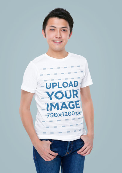 Simple Mockup of a Man Posing in a Studio While Wearing a Crew-Neck Tee