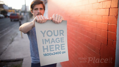 Stop Motion of a Poster Held by a Trendy Hipster Man In The Street a13653b