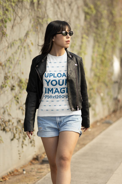 T-Shirt Mockup of a Cool Woman Walking Down The Street