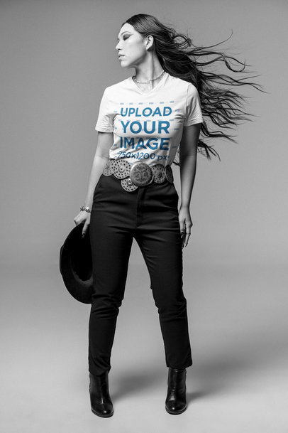 T-Shirt Mockup of a Long-Haired Fashionable Woman Posing in a Studio
