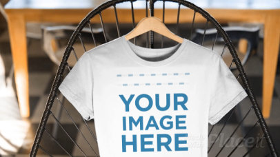 Closeup T-Shirt Mockup Video of a Round Neck Tee on a Cool Chair