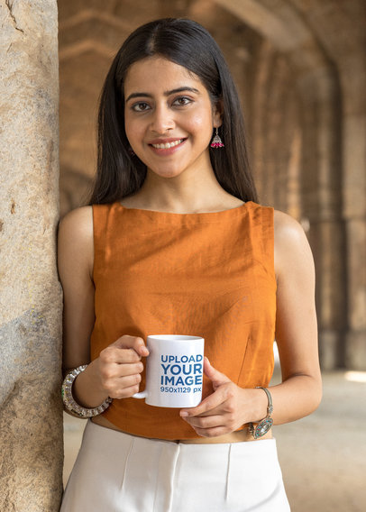 Coffee Mug Mockup of a Woman Smiling While Posing at an Ancient Temple