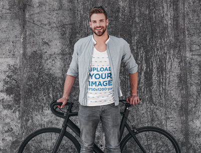 T-Shirt Mockup of a Smiling Bearded Man Standing by a Bike m20293-r-el2