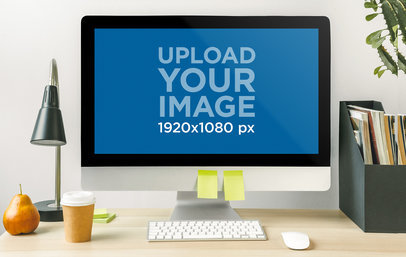 Mockup of an iMac Placed over an Office Table with Two Sticky Notes on the Frame m18909-r-el2