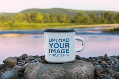 12 oz Enamel Mug Mockup Featuring a Lake Scenery in the Background
